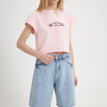 Roger's shirt is cropped