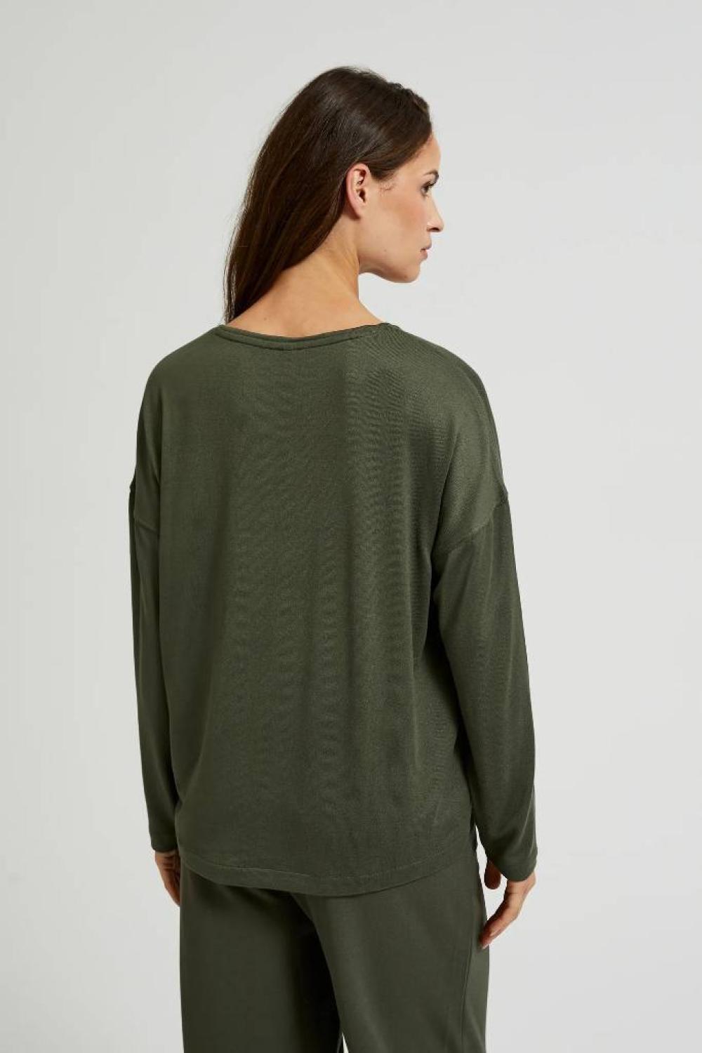 A olive sweater