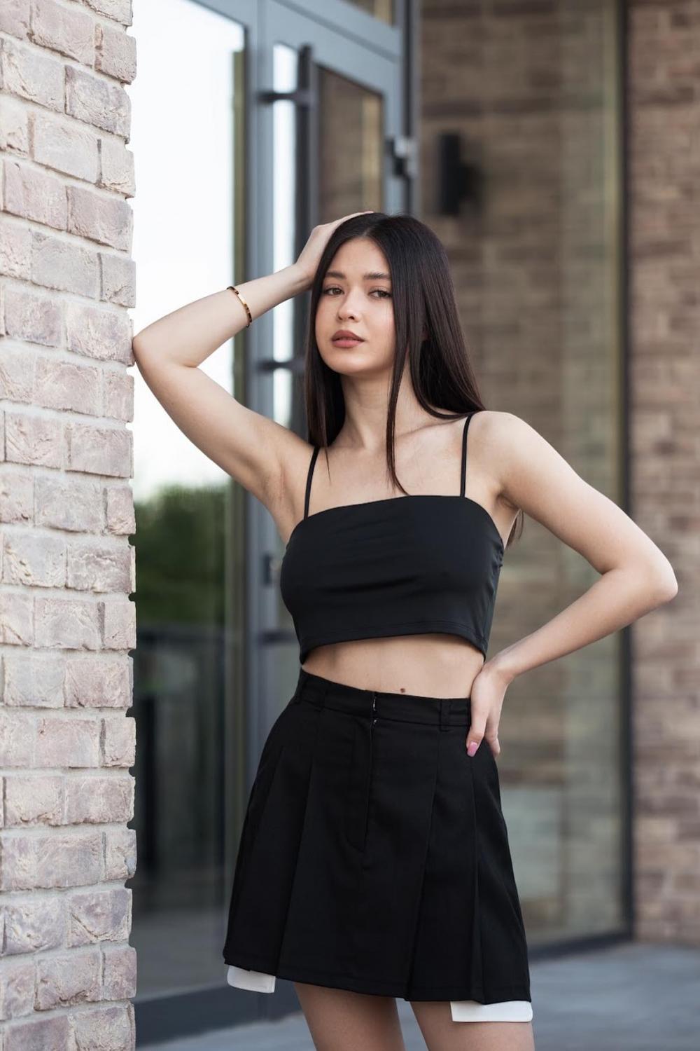 Black skirt with elongated pockets M-293 VERONIKA