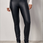 Black leggings made of eco-leather are insulated