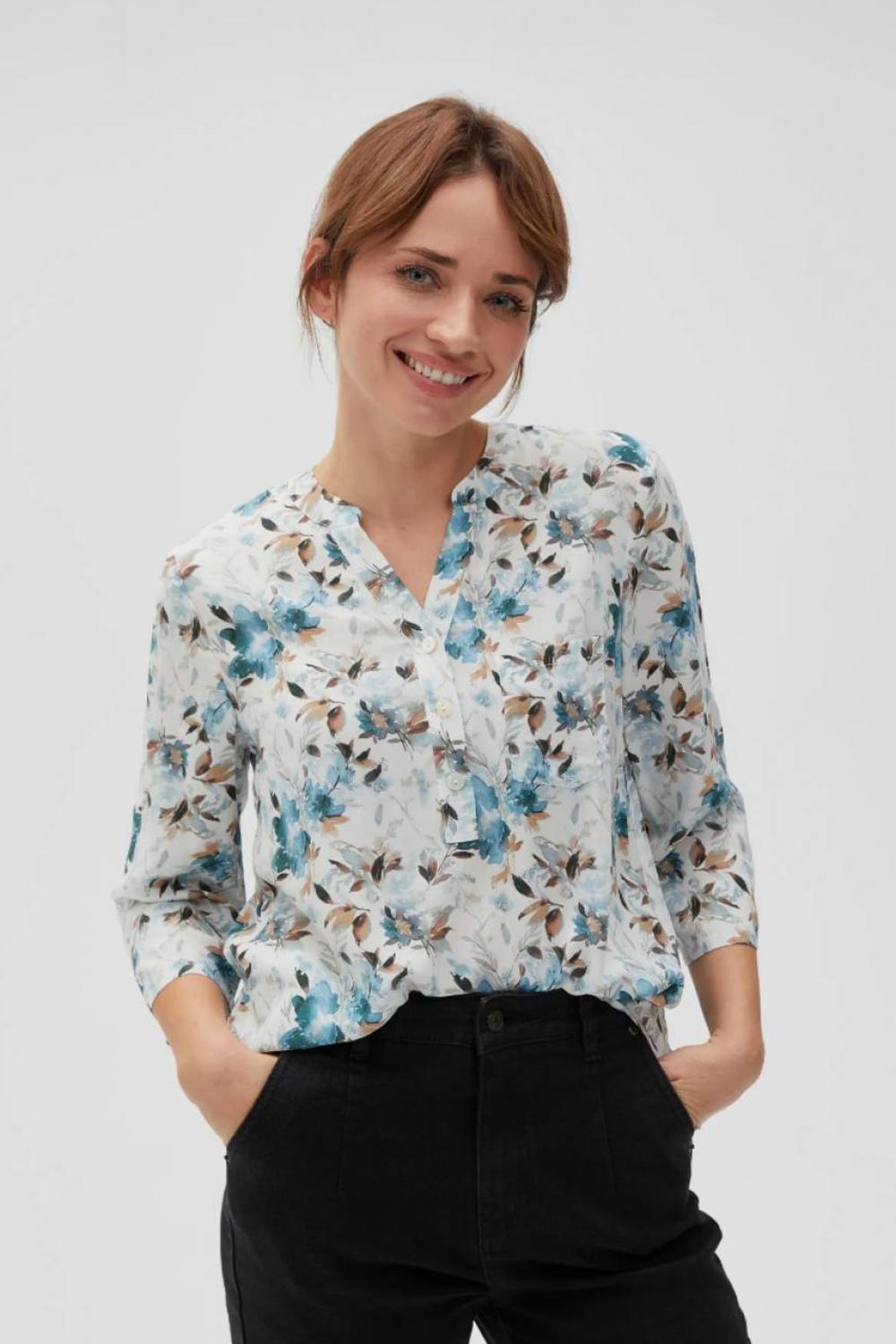 Green blouse in floral print