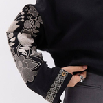 Black embroidery with gold