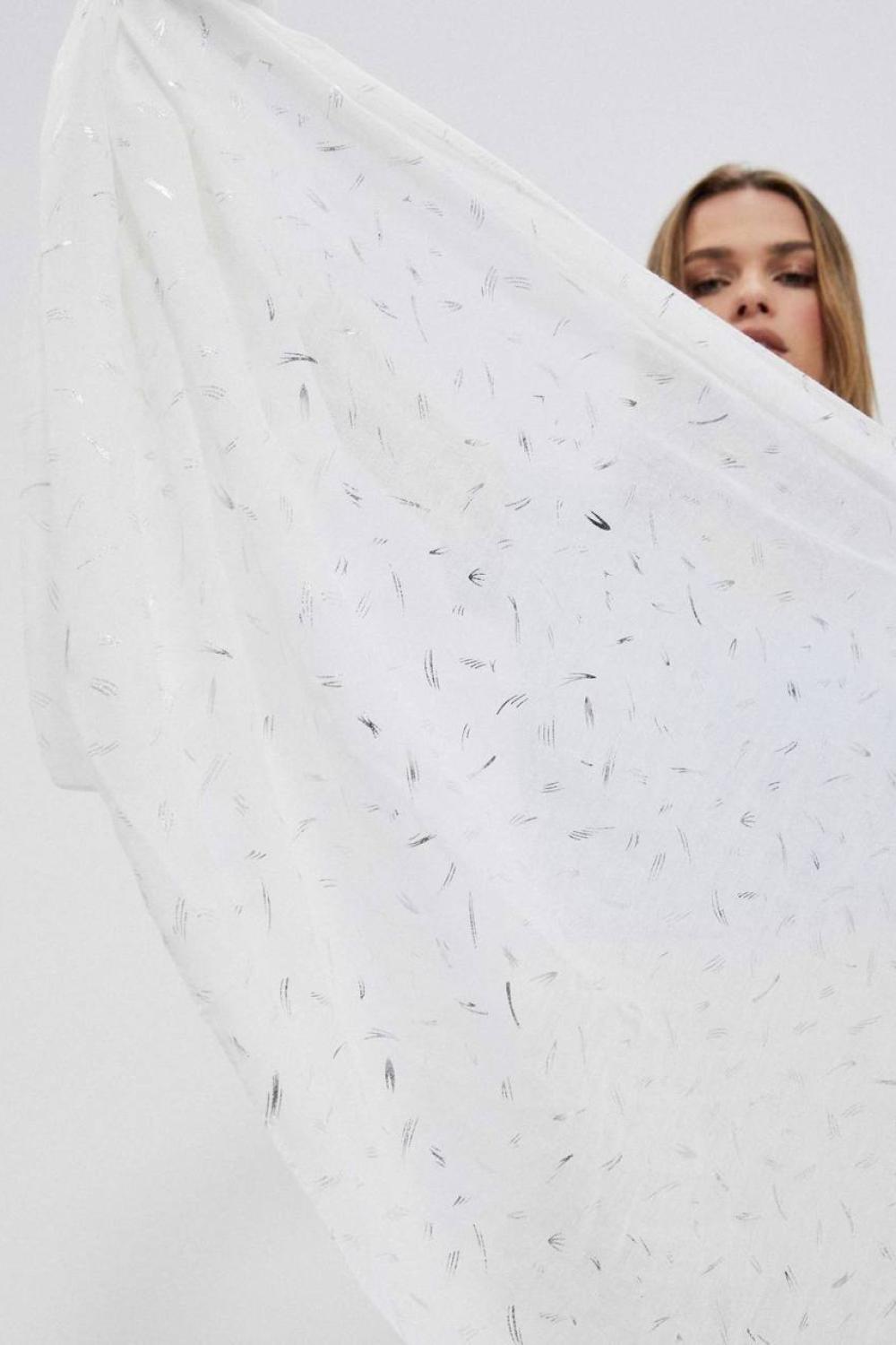 A white scarf with silver print MOODO