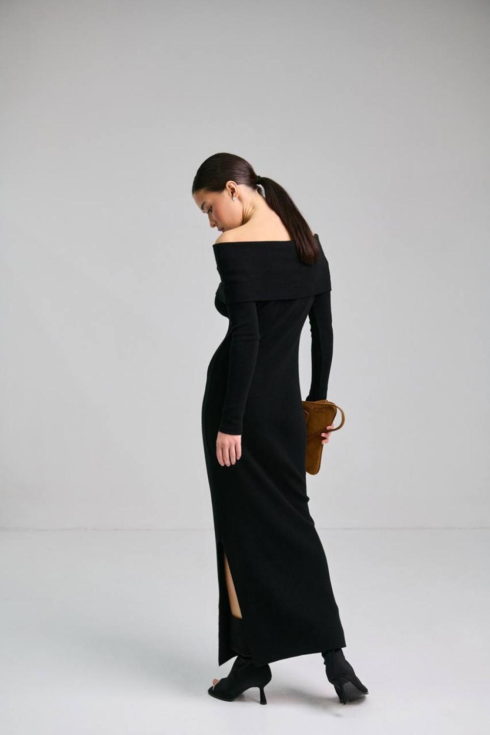 Knitted black dress with open shoulders