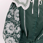 Khrystyna's embroidered dress of the author's work in emerald color