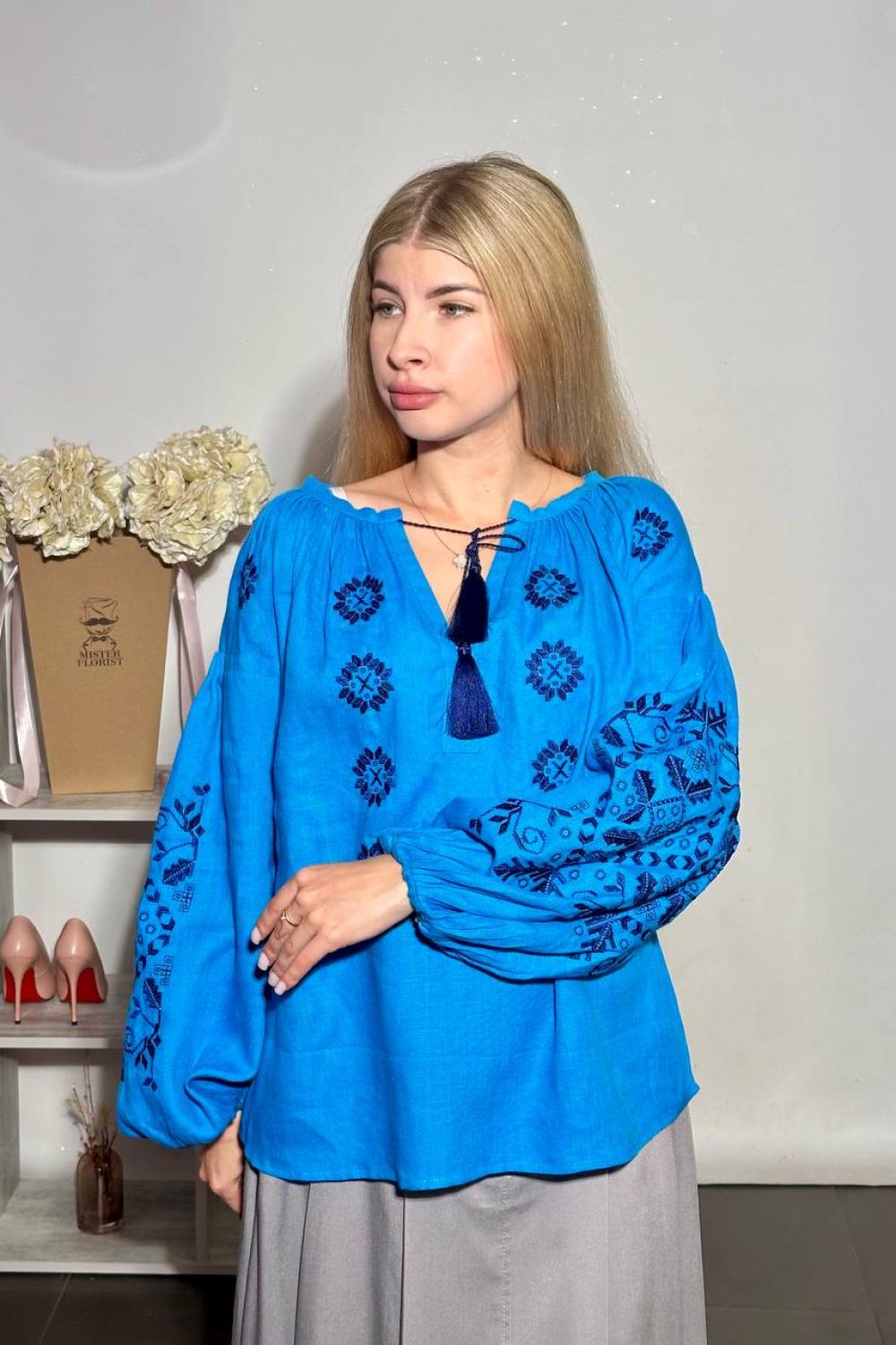 Women's blue embroidered shirt of the author's work