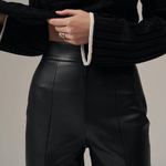 Black straight trousers made of eco-leather with a suede base