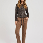 A brown polka dot sweater
