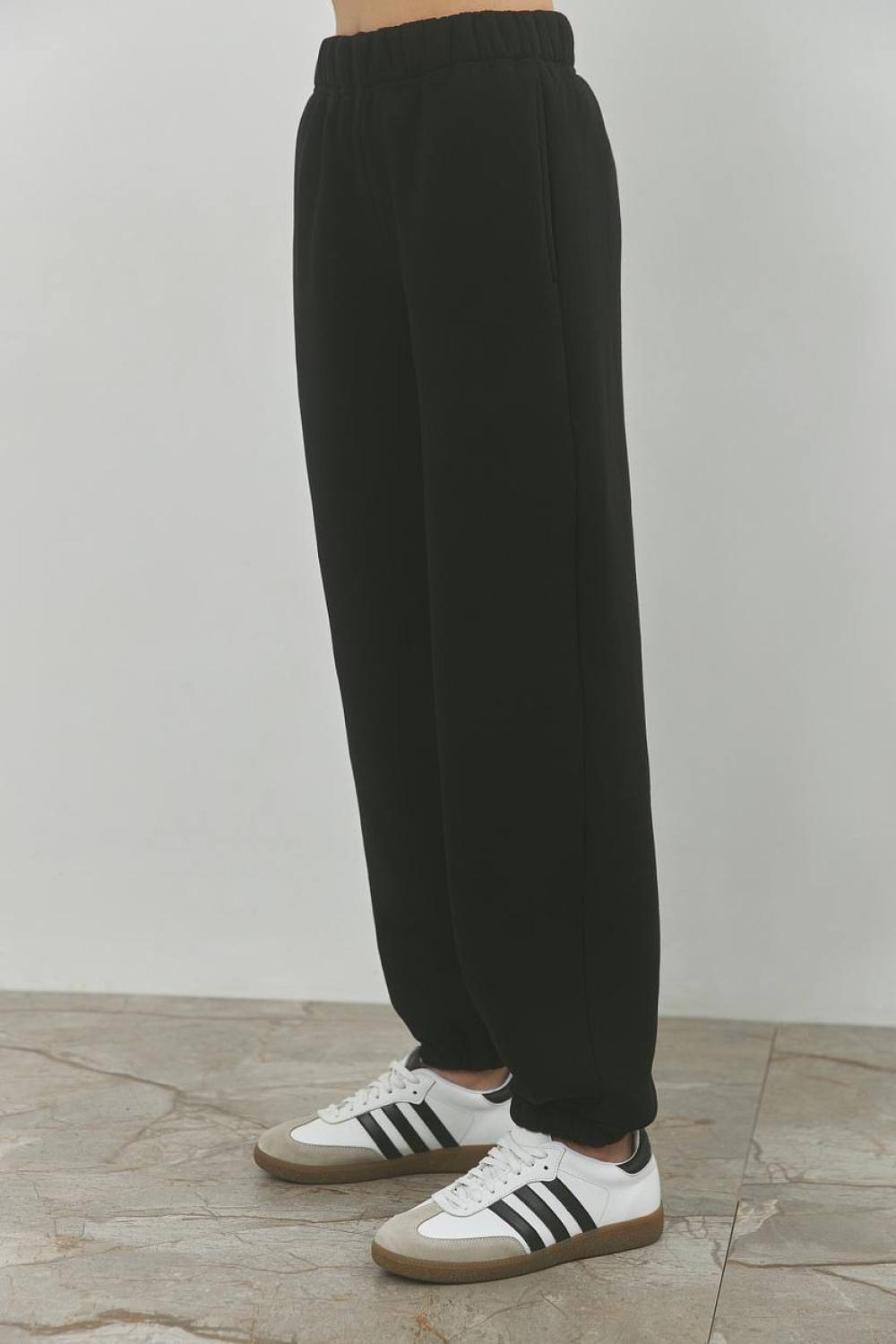 Black women's joggers on a bike