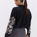 Black embroidery with gold