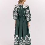Khrystyna's embroidered dress of the author's work in emerald color