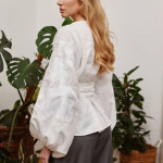 Women's embroidered white on white author's work