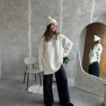 Білий светр oversized з вовни