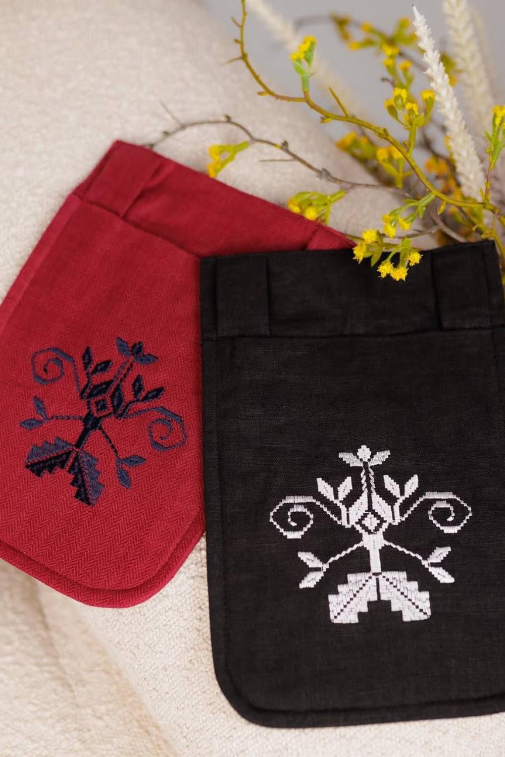 An embroidered accessory pocket