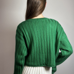 Sweater knitted with a free cut green Tilya STIMMA