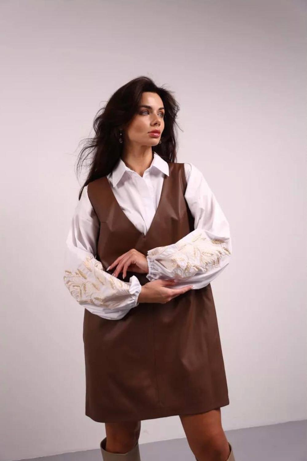 A classic white blouse with embroidered ears of corn