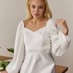 White midi length dress for a formal occasion