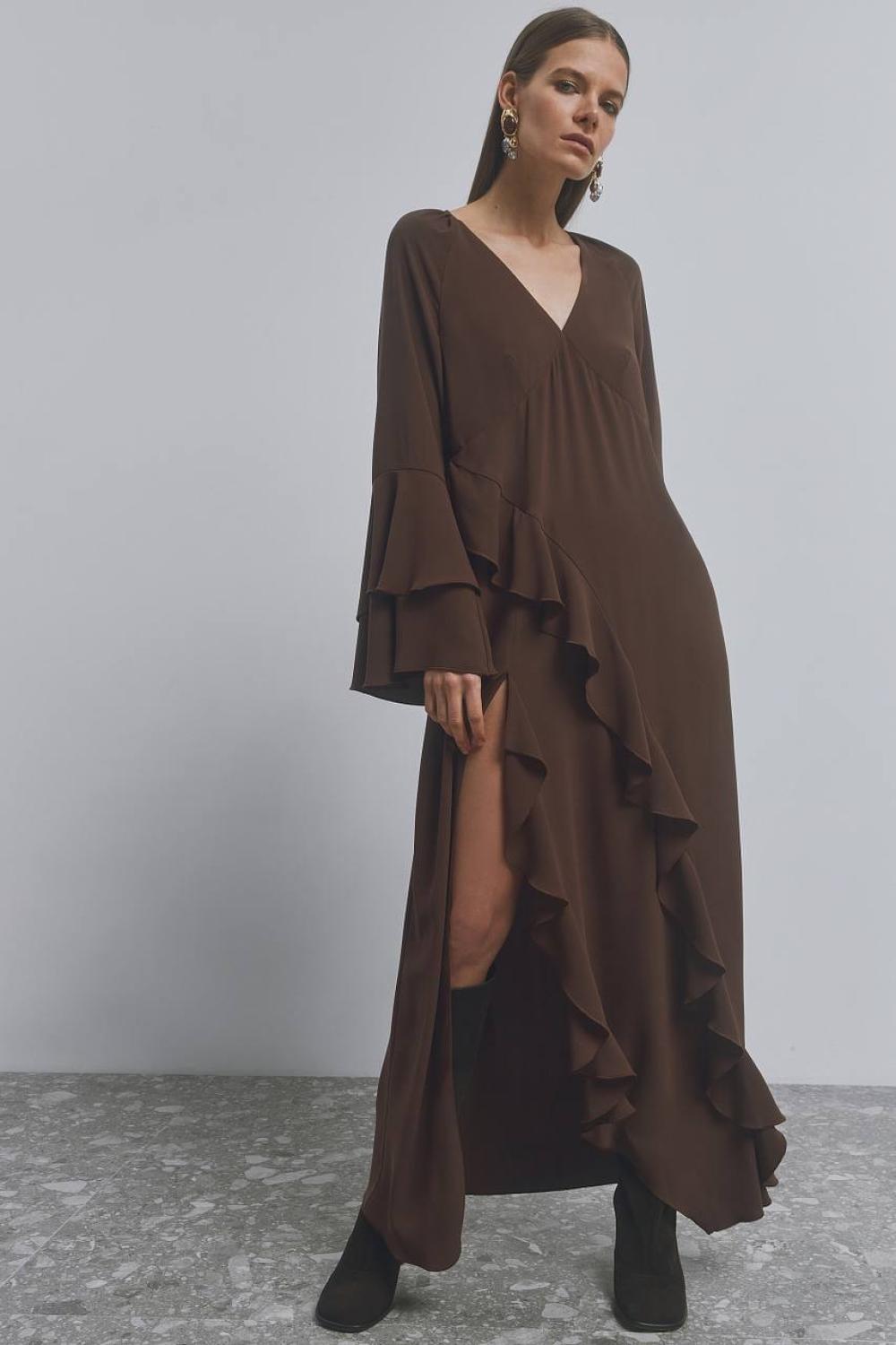 A long loose-fitting dress with ruffles