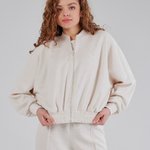Trouser suit made of high-quality knitwear with an ivory stripe