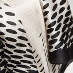 A beige and black silk scarf MOODO