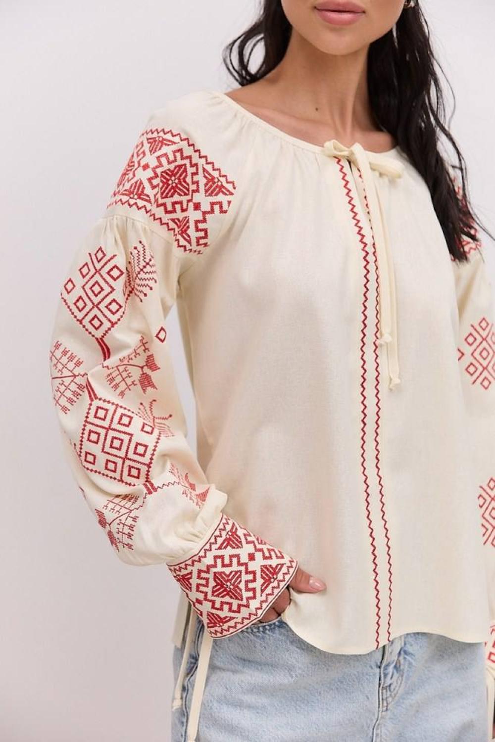 Women's embroidered beige shirt with red embroidery