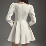 Mini dress with imitation corset at the waist.