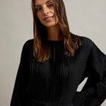 Black dress made of technicolor fabric