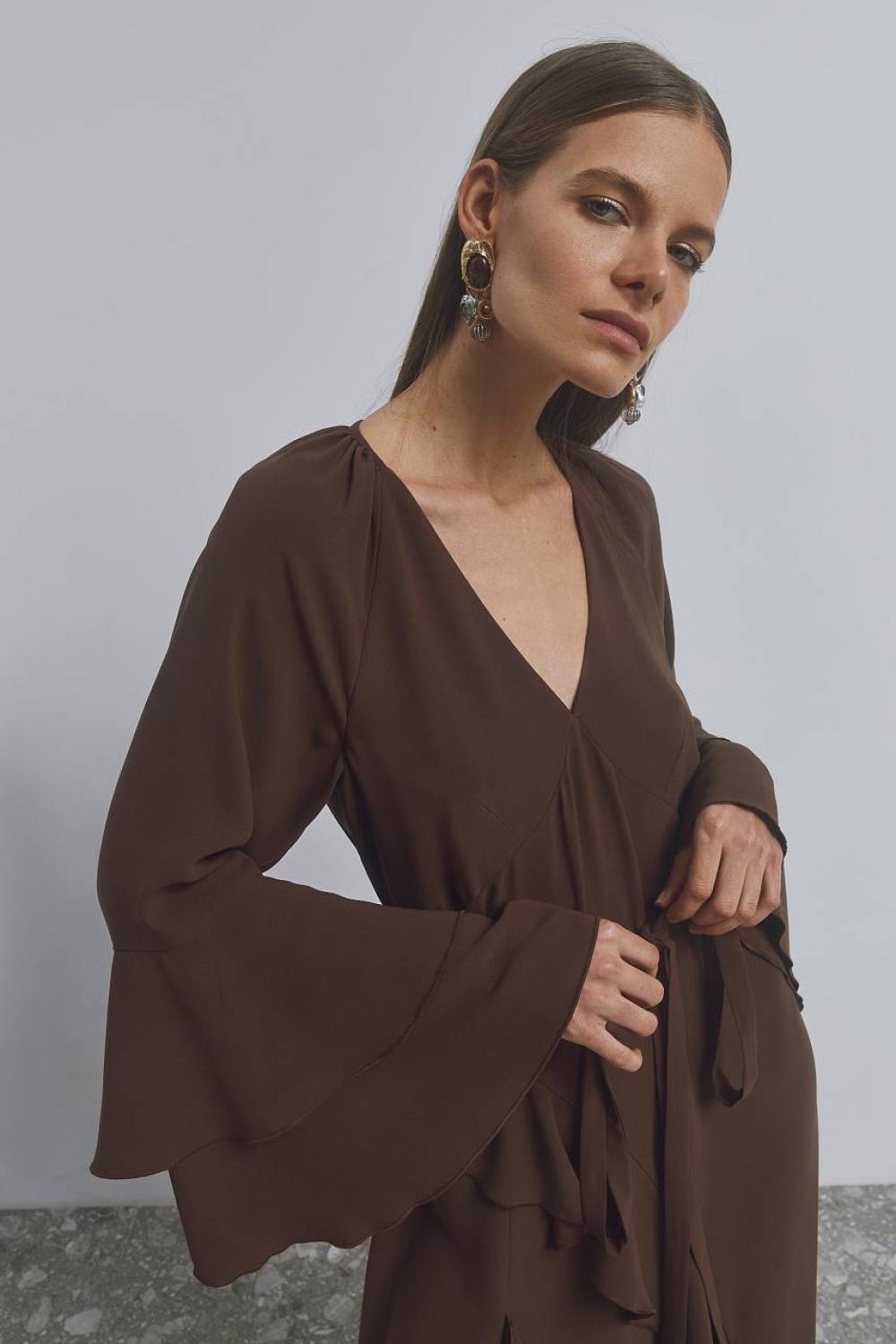A long loose-fitting dress with ruffles