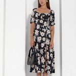 Black silk dress in floral print
