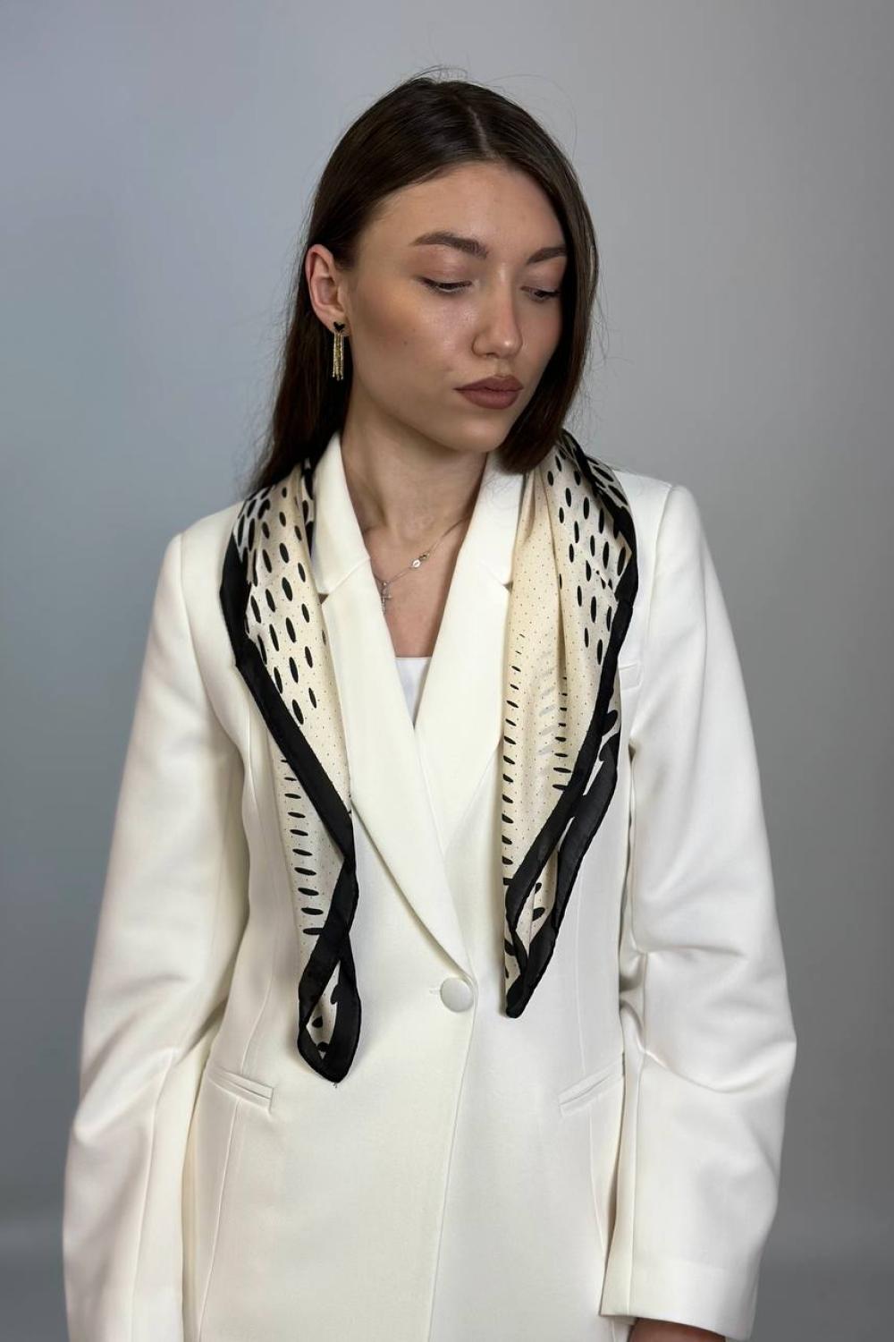 A beige and black silk scarf MOODO