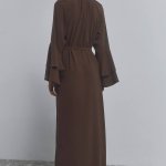 A long loose-fitting dress with ruffles
