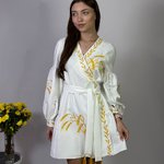 Women's white embroidered dress with gold embroidered spikes