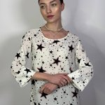 Blouse is printed with red rhinestones