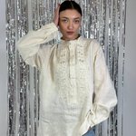 Men's embroidered shirt in a traditional style in a milky ceremonial color