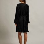 Black dress made of technicolor fabric