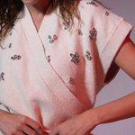 Milk-colored knitted vest nikandra
