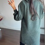 A loose-fitting knitted dress