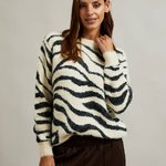 A women's jumper with a geometric pattern