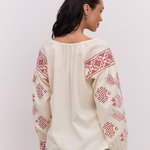 Women's embroidered beige shirt with red embroidery