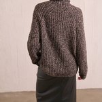 Black and pink wool sweater