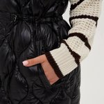 Long quilted vest with hood