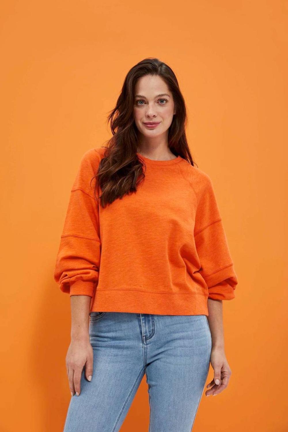 women's sweatshirt is presented in a bright orange color