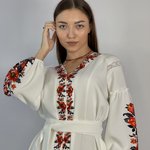 The dress is white with red Hardy flowers
