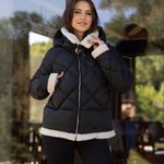 Jacket in black color with artificial fur