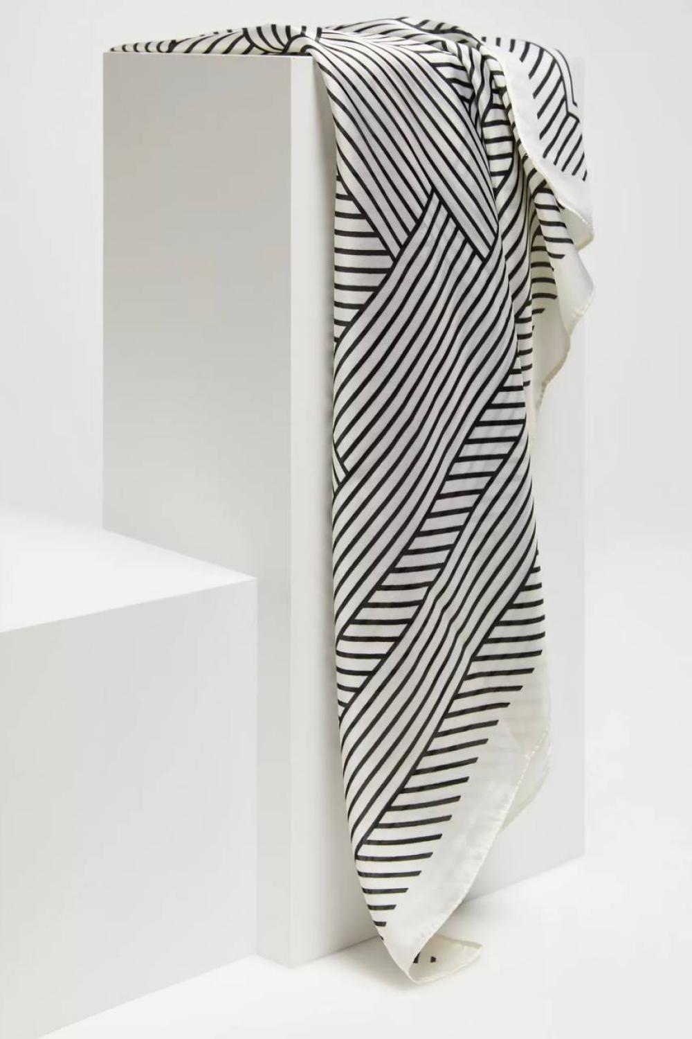 A beige and black silk scarf MOODO