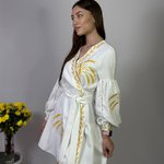 Women's white embroidered dress with gold embroidered spikes