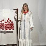 Вишита біла сукня з срібною вишивкою