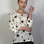 Blouse is printed with red rhinestones