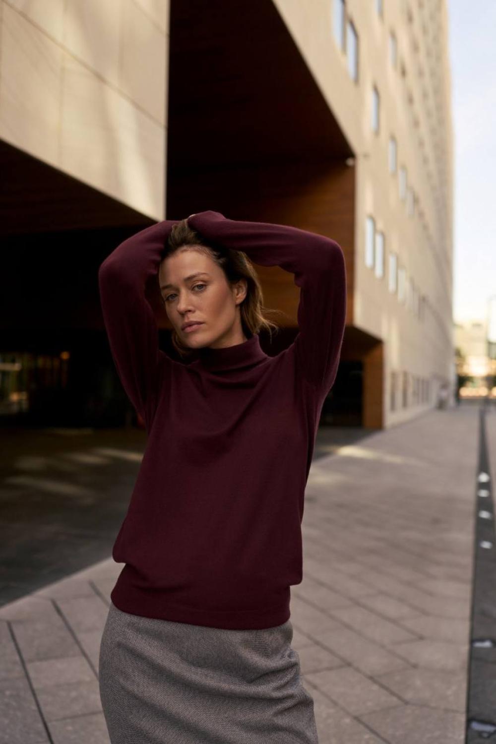 Women's burgundy-colored turtleneck