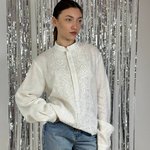 Men's embroidered shirt in a traditional style in a white ceremonial color